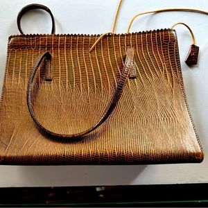 Vintage square leather bag with matching change purse.